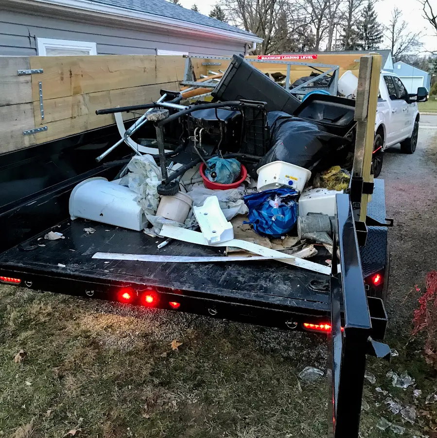 Roll-off dumpster delivered to a residential driveway in Erwin